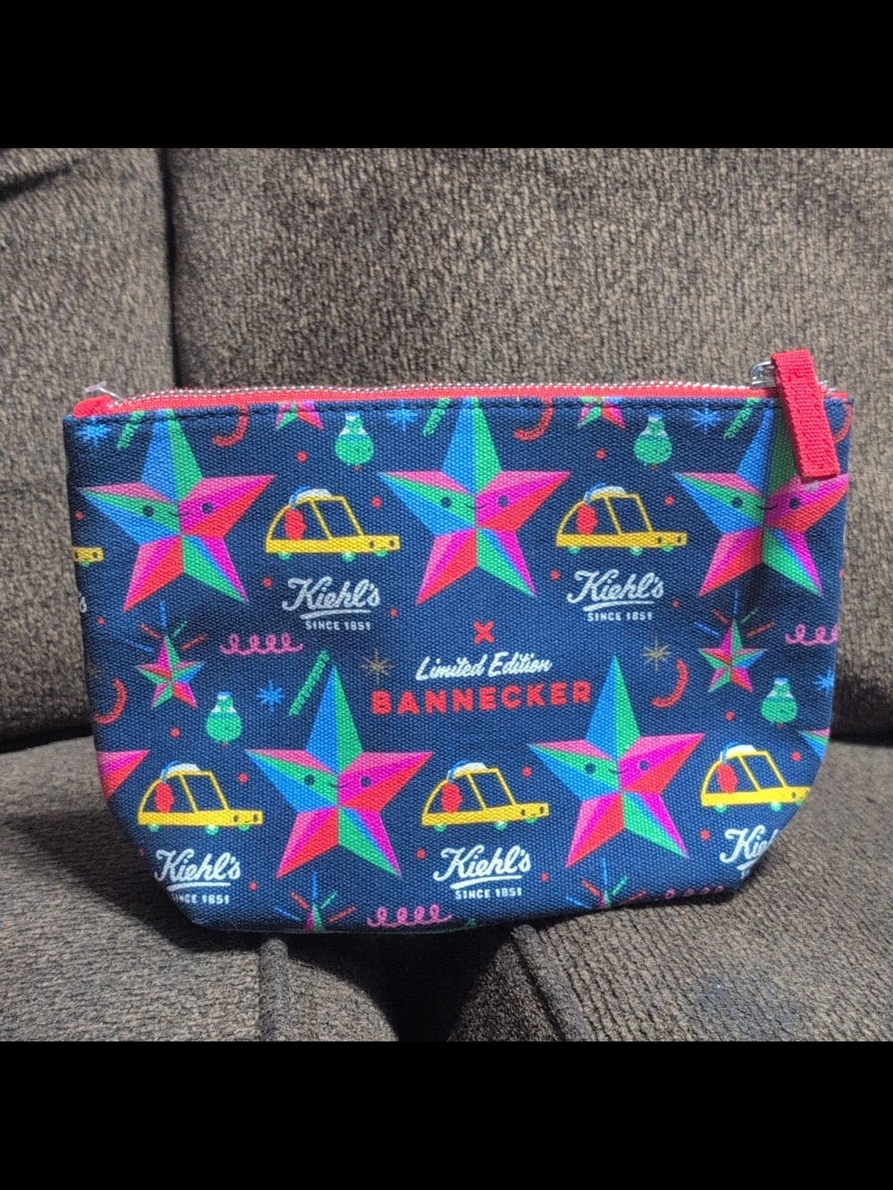 Kiehl's Navy Cosmetic Pouch with Neon Stars and Yellow Taxi Accents
